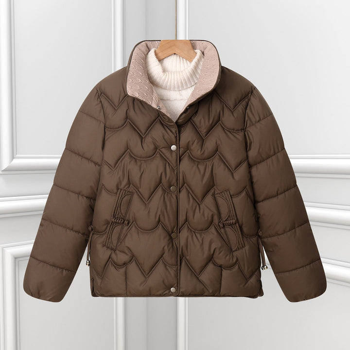 Women’s short quilted jacket with curved quilting and snap-button placket