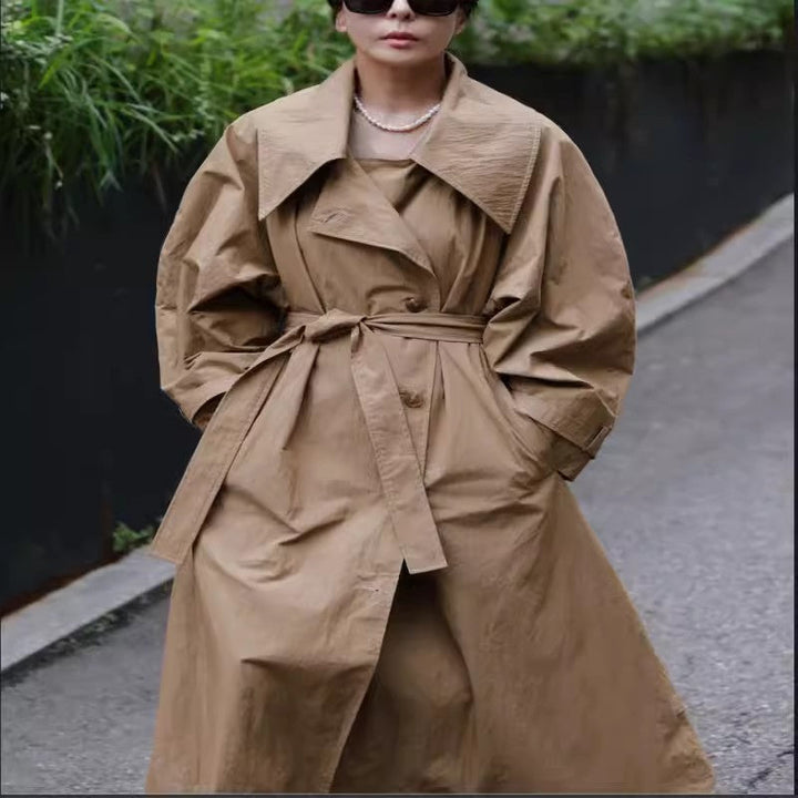 Women’s oversized trench coat with waterfall collar and tie belt