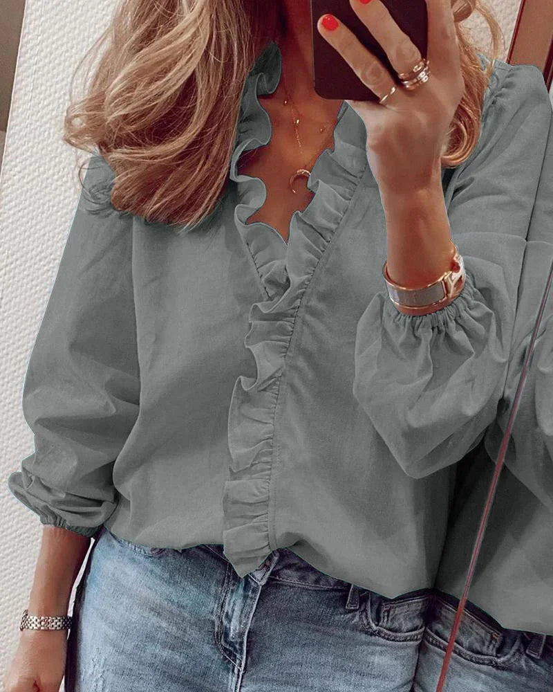 Enola™ | Feminine blouse with playful ruffles