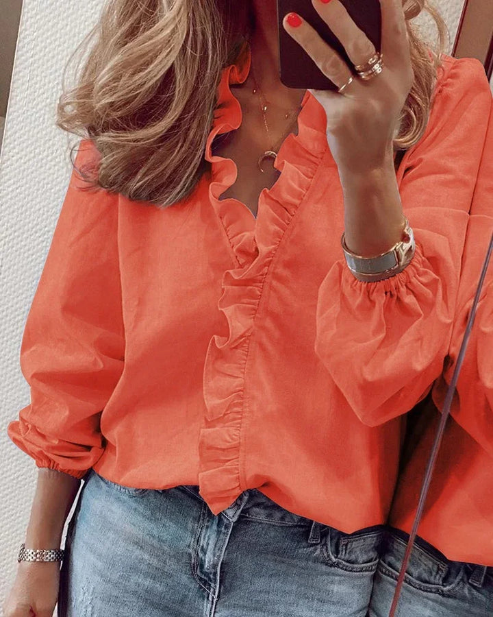 Enola™ | Feminine blouse with playful ruffles
