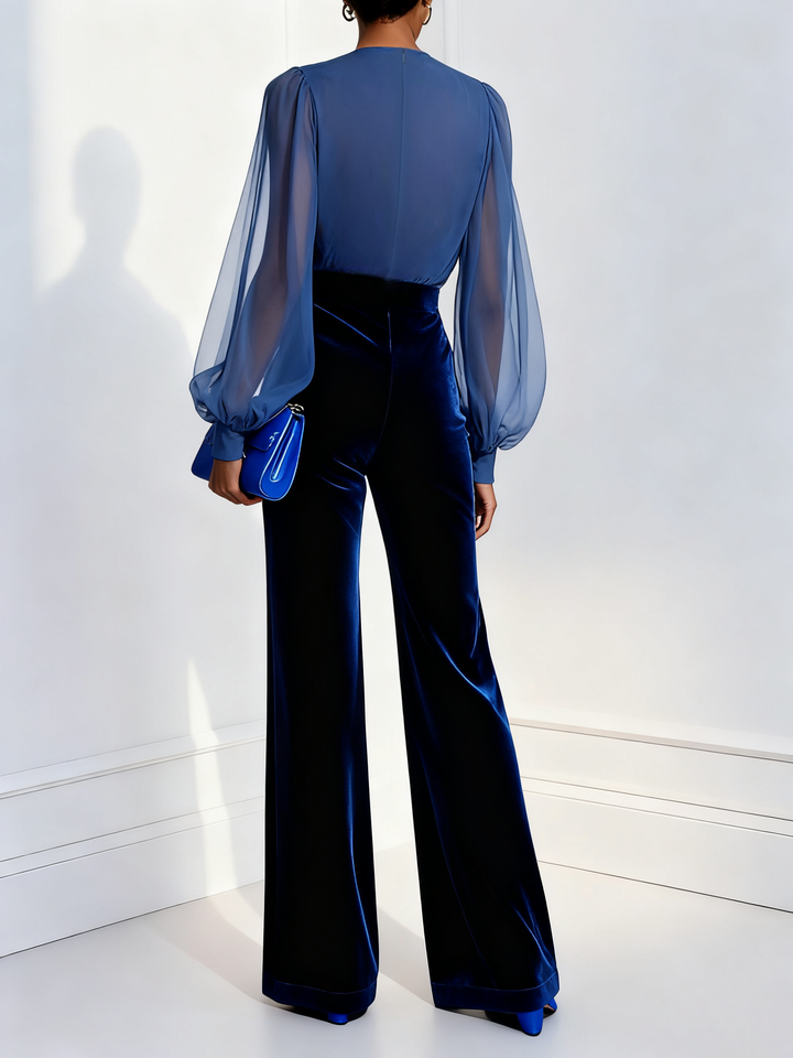 Velvet jumpsuit with long sleeves and blue mesh V-neck