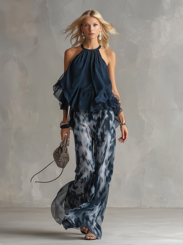 Ludovica – Chic ensemble with high-neck blouse shirt and flowing printed trousers