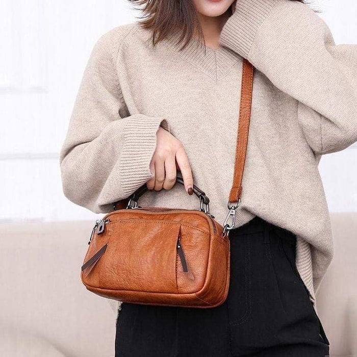 Finbjørg | Small and versatile bag in a golden cognac shade