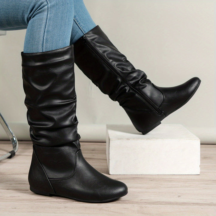Valdis | Women’s ankle boots with side zipper