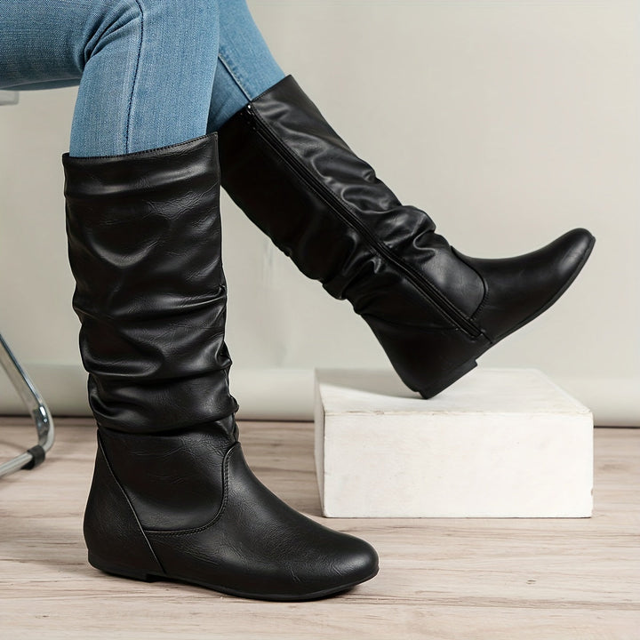 Valdis | Women’s ankle boots with side zipper