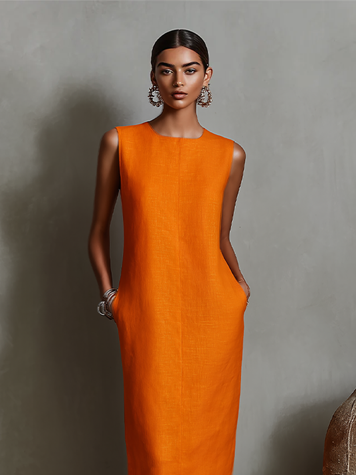 Women's orange sheath dress with sleeveless crew neck and side pockets, timeless minimalist-elegant style