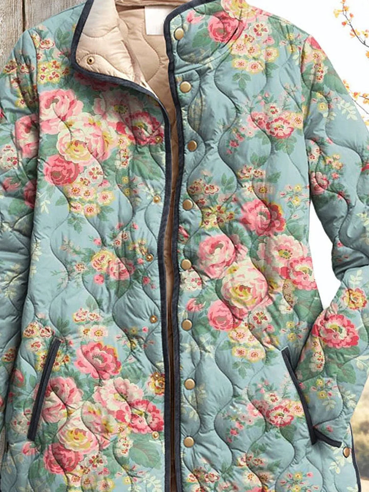 Women's quilted jacket with a beautiful floral pattern