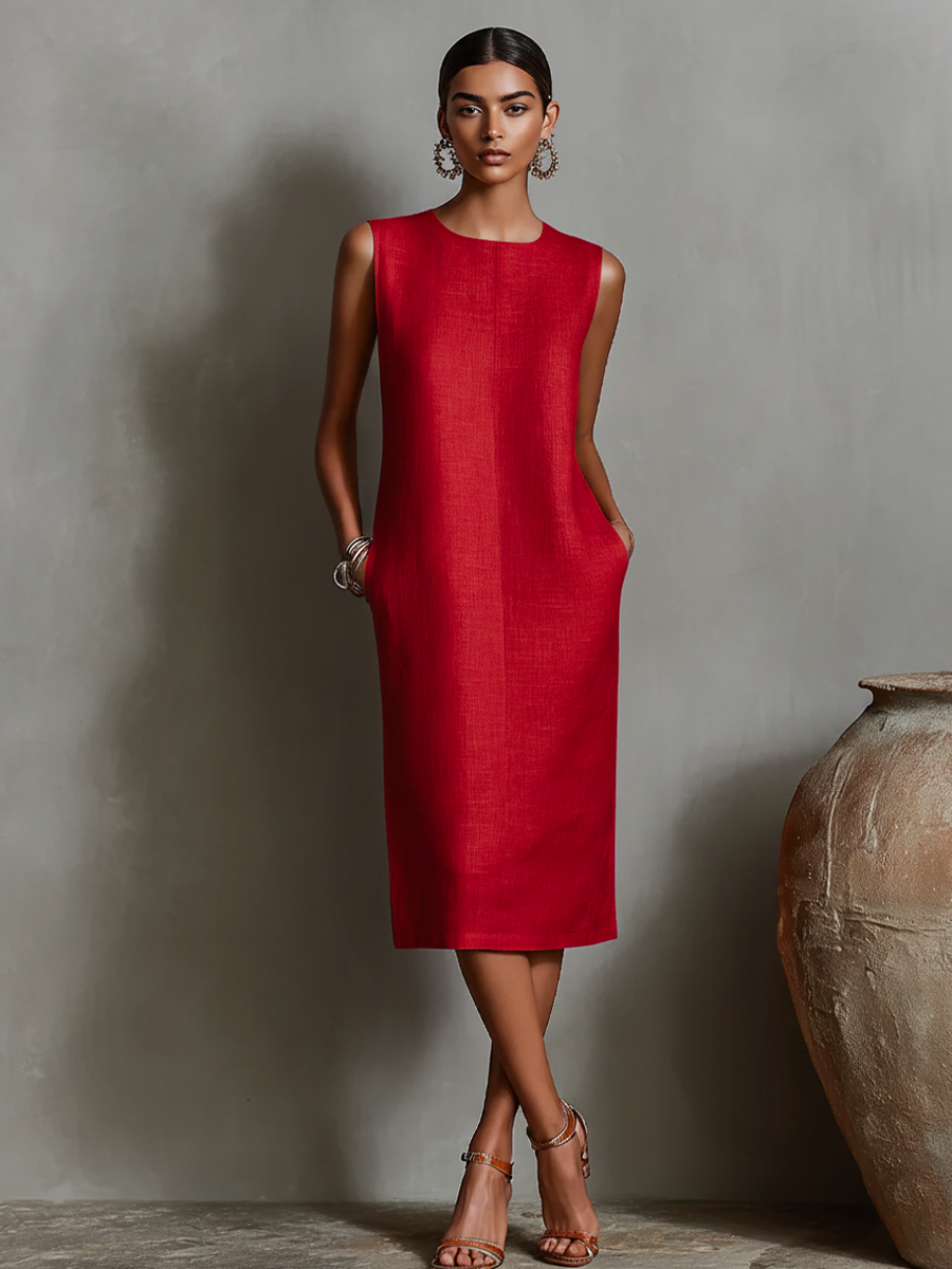Women's orange sheath dress with sleeveless crew neck and side pockets, timeless minimalist-elegant style