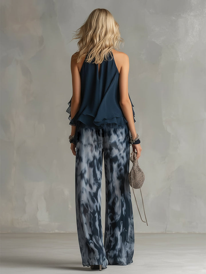 Ludovica – Chic ensemble with high-neck blouse shirt and flowing printed trousers