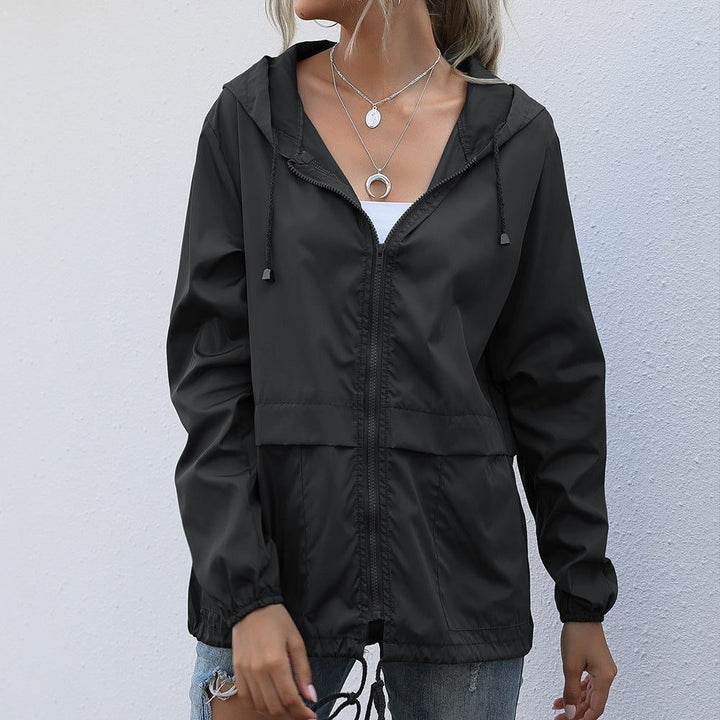 Women's raincoat with hood and drawstring