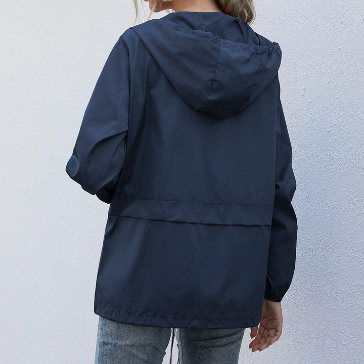 Women's raincoat with hood and drawstring