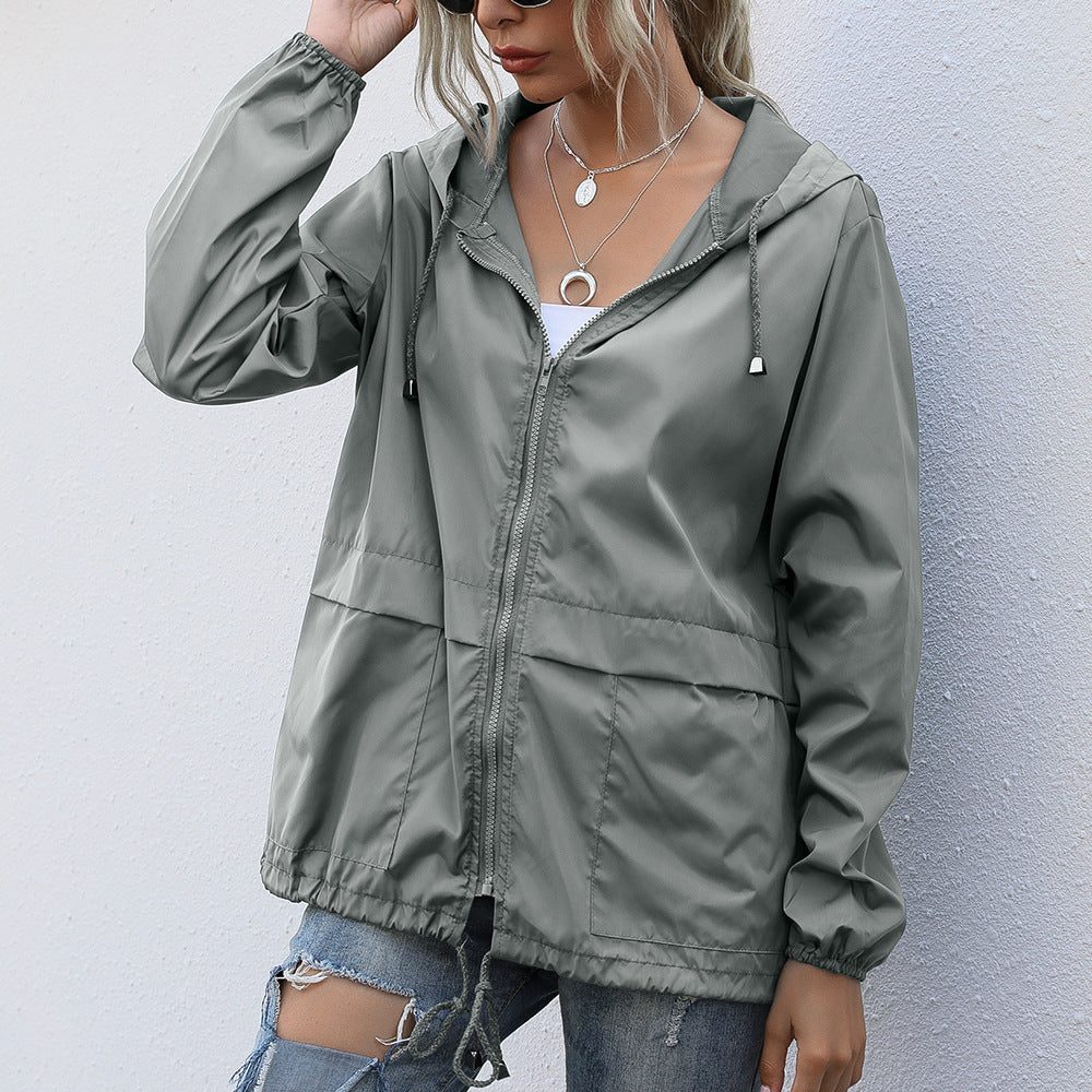 Women's raincoat with hood and drawstring