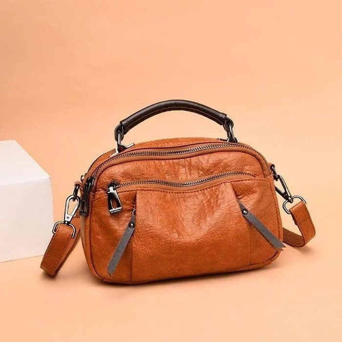 Finbjørg | Small and versatile bag in a golden cognac shade