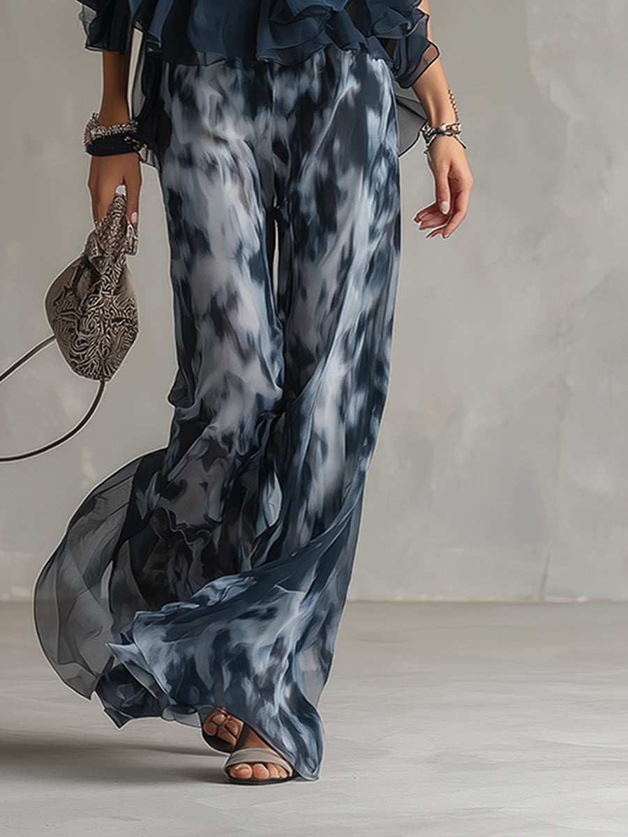 Ludovica – Chic ensemble with high-neck blouse shirt and flowing printed trousers