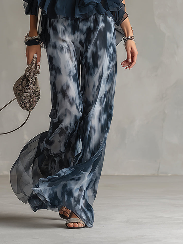 Ludovica – Chic ensemble with high-neck blouse shirt and flowing printed trousers