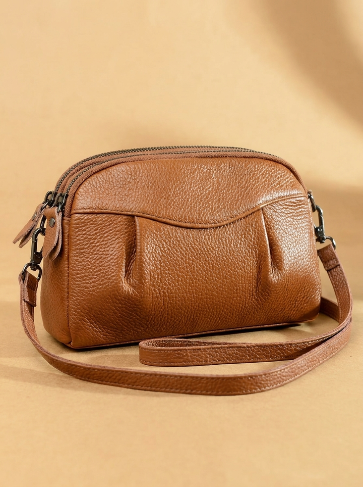 Finbjørg | Small and versatile bag in a golden cognac shade