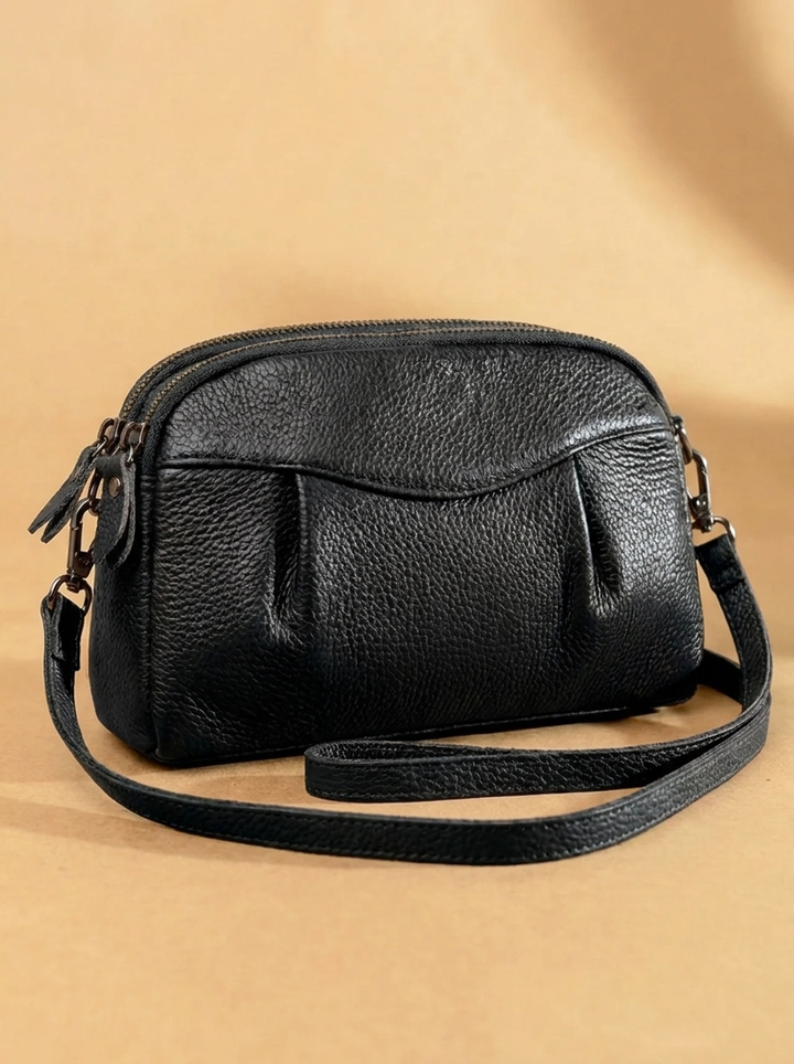 Finbjørg | Small and versatile bag in a golden cognac shade