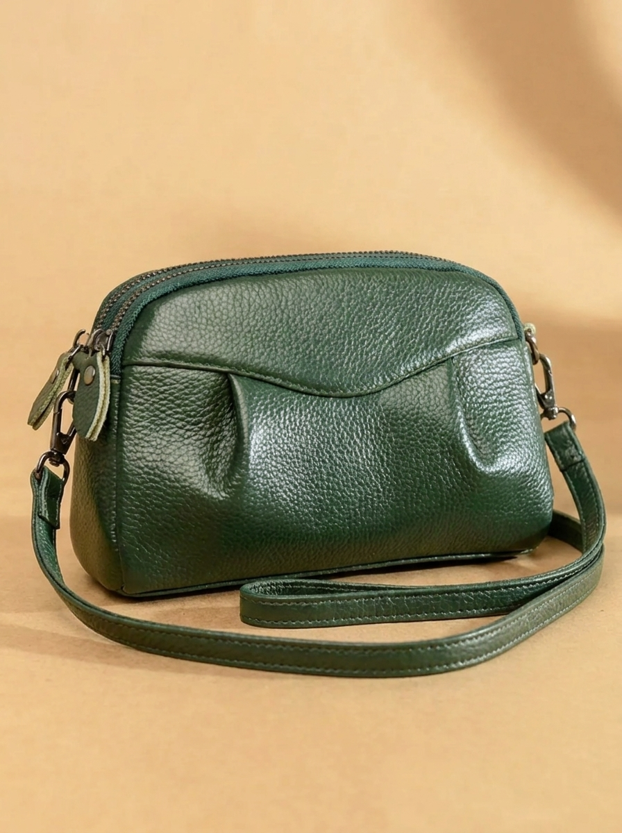 Finbjørg | Small and versatile bag in a golden cognac shade