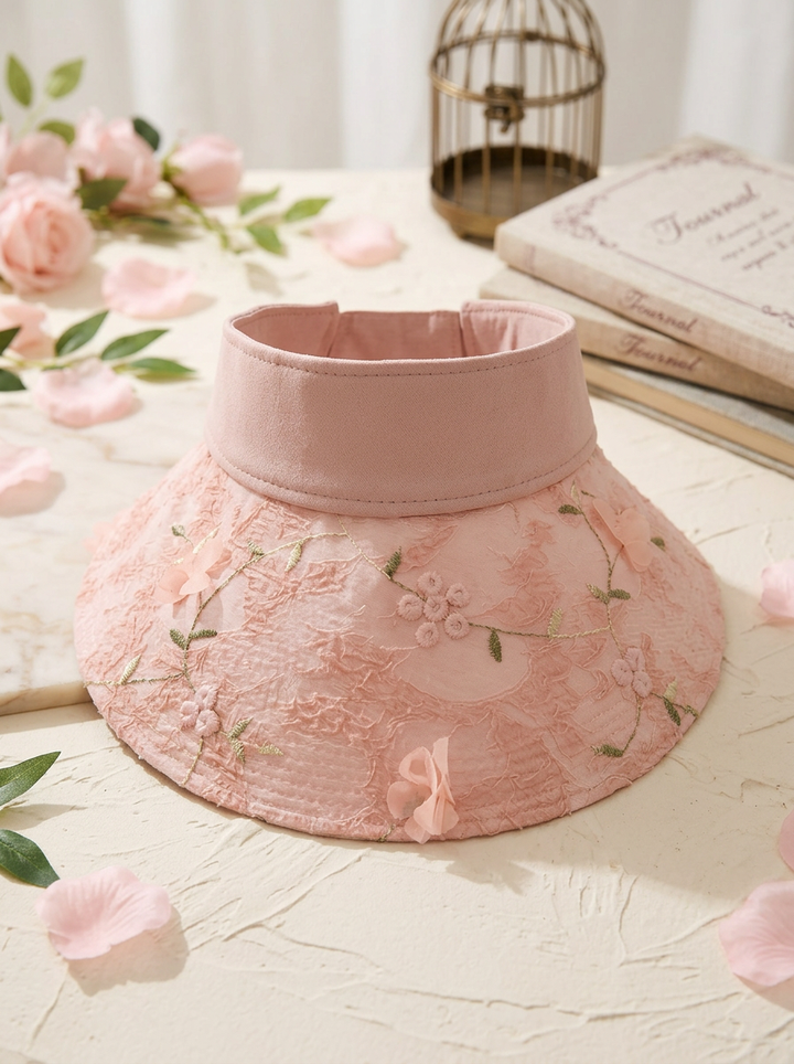 Foldable straw hat with floral accent and UV protection