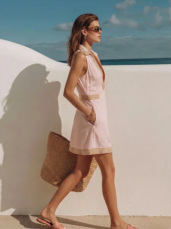 Women's sleeveless mini dress with pockets and buttons