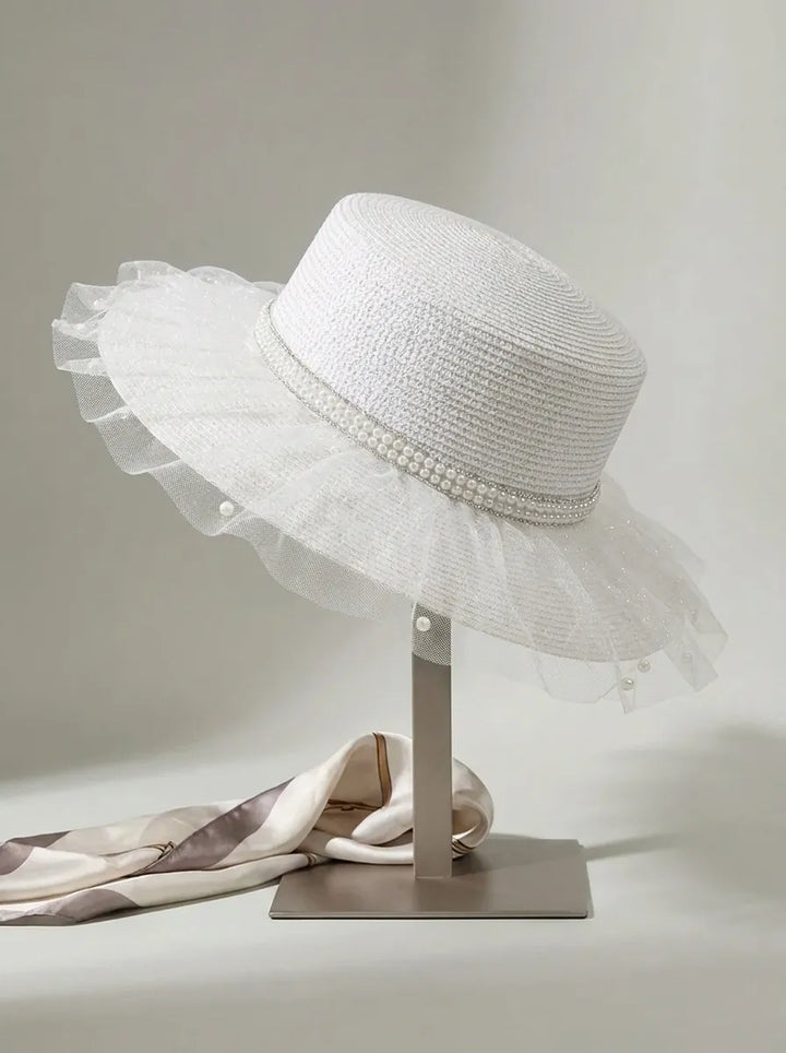 Women's sun hat with tulle trim and pearl embellishment