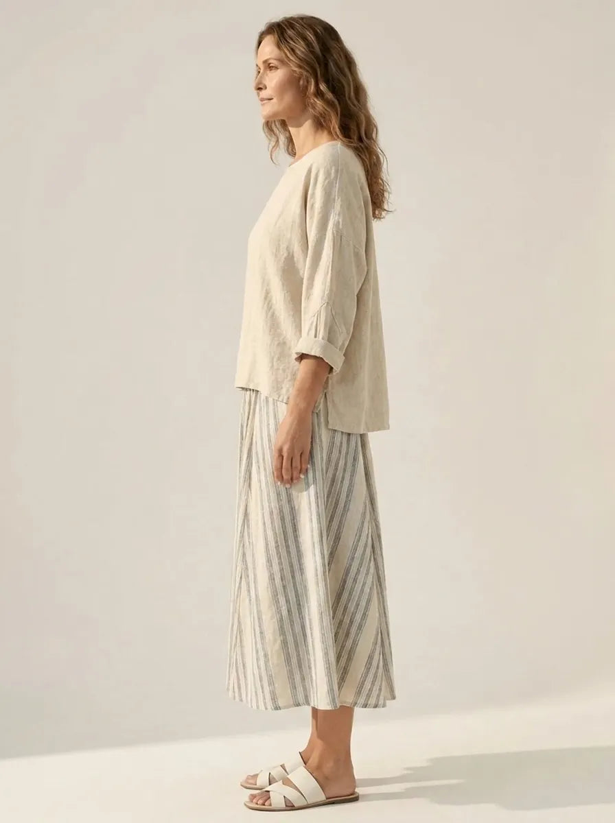 Aurora – Comfortable Blouse and Striped Midi Skirt