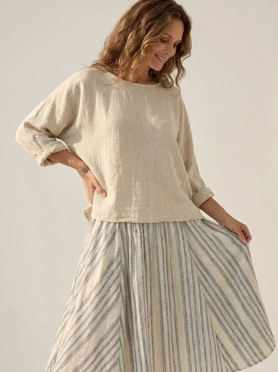 Aurora – Comfortable Blouse and Striped Midi Skirt