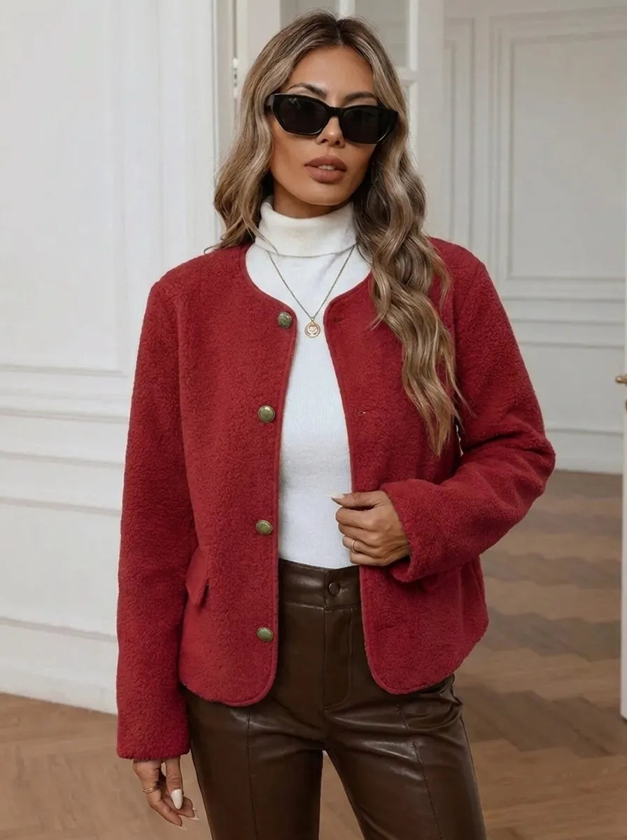Women's jacket with gold buttons and side pockets