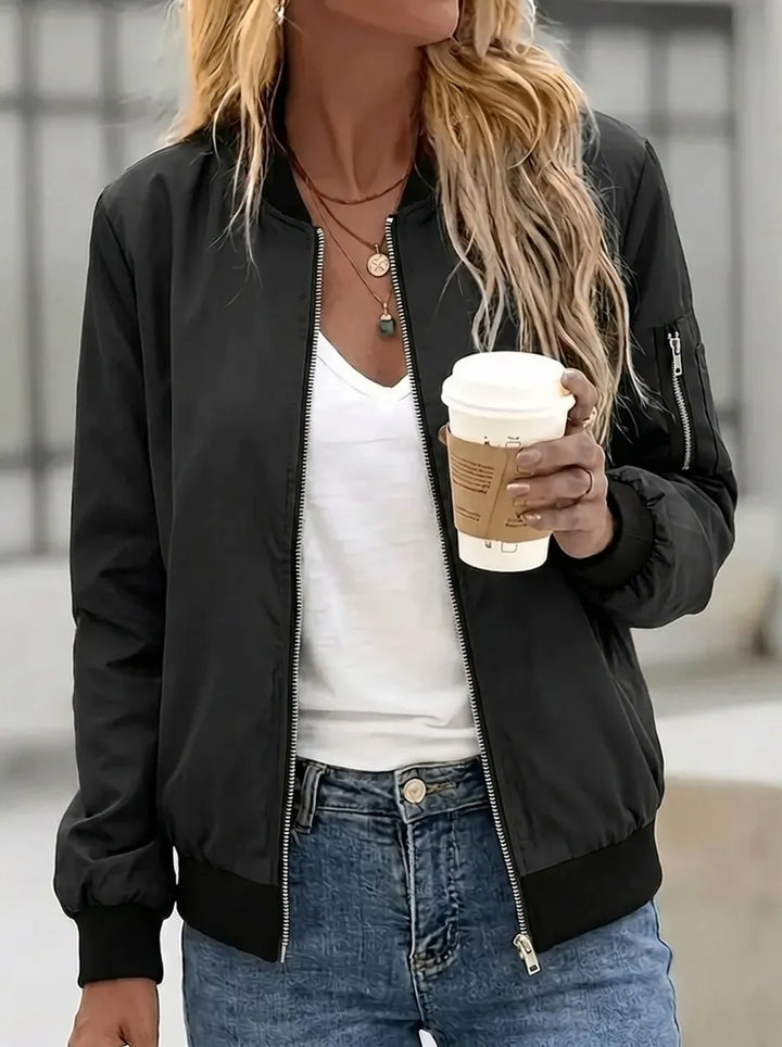 Women's bomber jacket with practical pockets and zipper closure