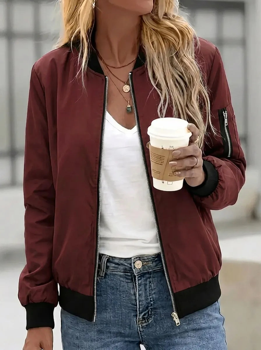 Women's bomber jacket with practical pockets and zipper closure