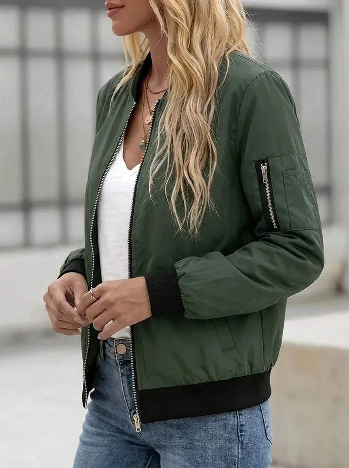 Women's bomber jacket with practical pockets and zipper closure