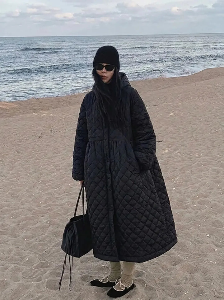 Women’s oversized quilted maxi-length coat with diamond quilting