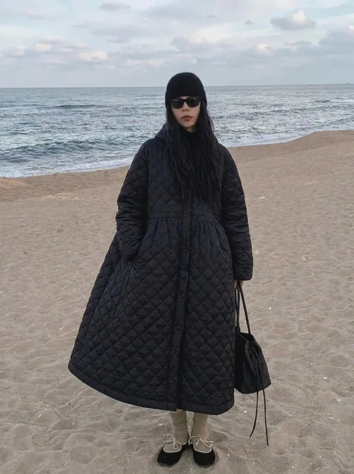 Women’s oversized quilted maxi-length coat with diamond quilting