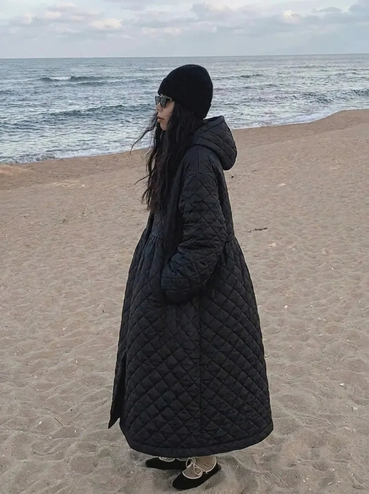 Women’s oversized quilted maxi-length coat with diamond quilting