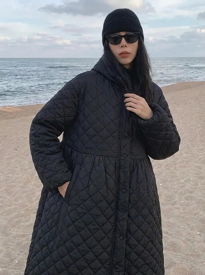 Women’s oversized quilted maxi-length coat with diamond quilting
