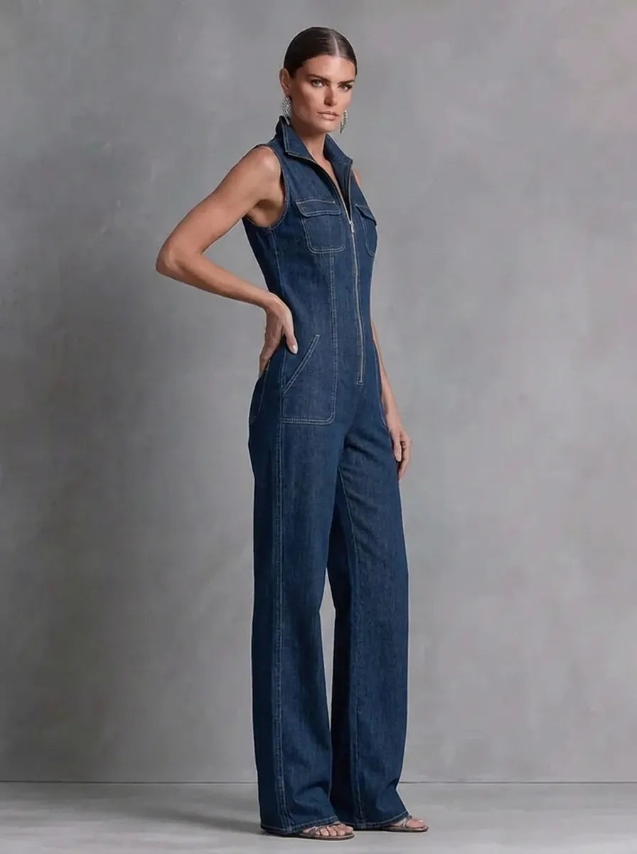 Dark blue retro-style sleeveless jumpsuit for women with a stand collar, flared cut, and front zipper