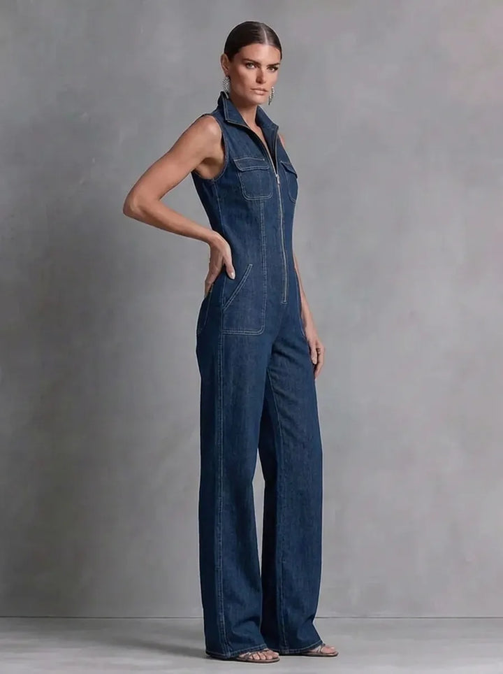 Dark blue retro-style sleeveless jumpsuit for women with a stand collar, flared cut, and front zipper