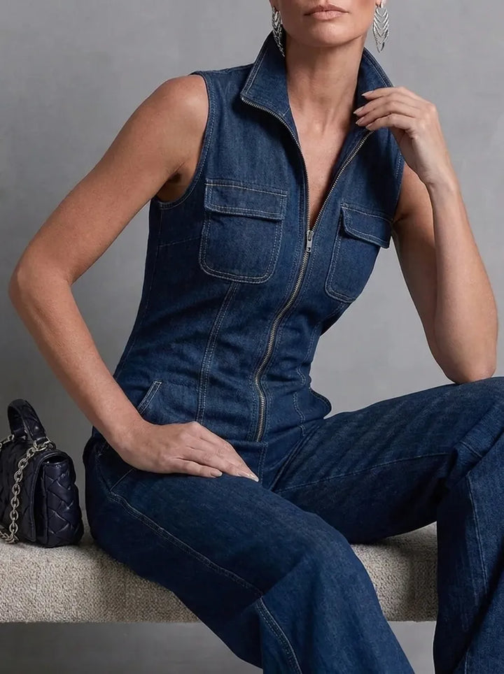 Dark blue retro-style sleeveless jumpsuit for women with a stand collar, flared cut, and front zipper
