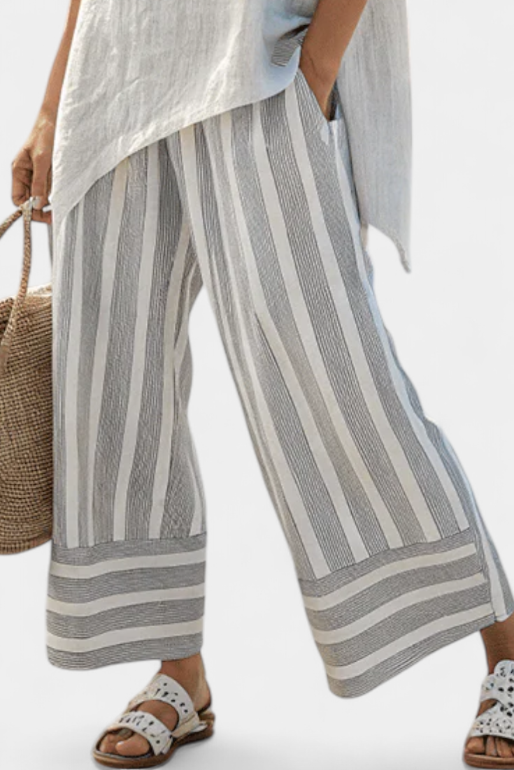 Fiorella - elegant asymmetrical blouse and striped trousers