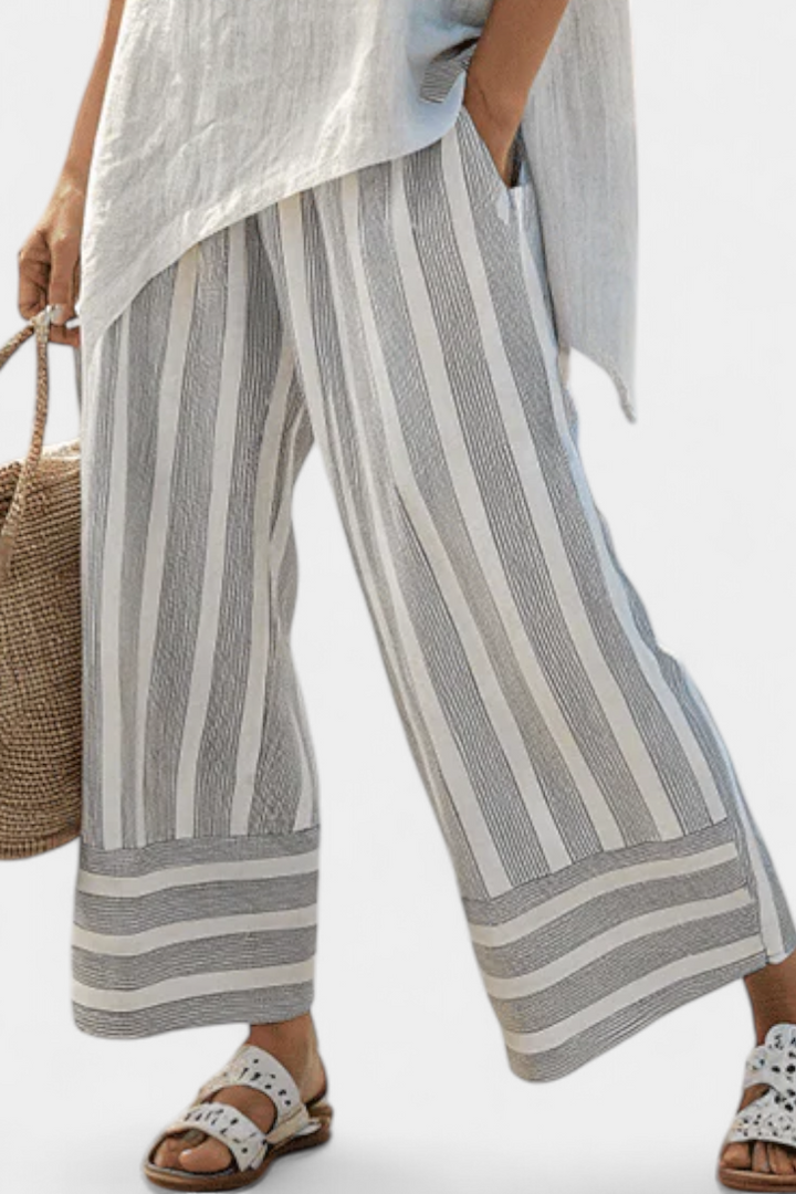 Fiorella - elegant asymmetrical blouse and striped trousers
