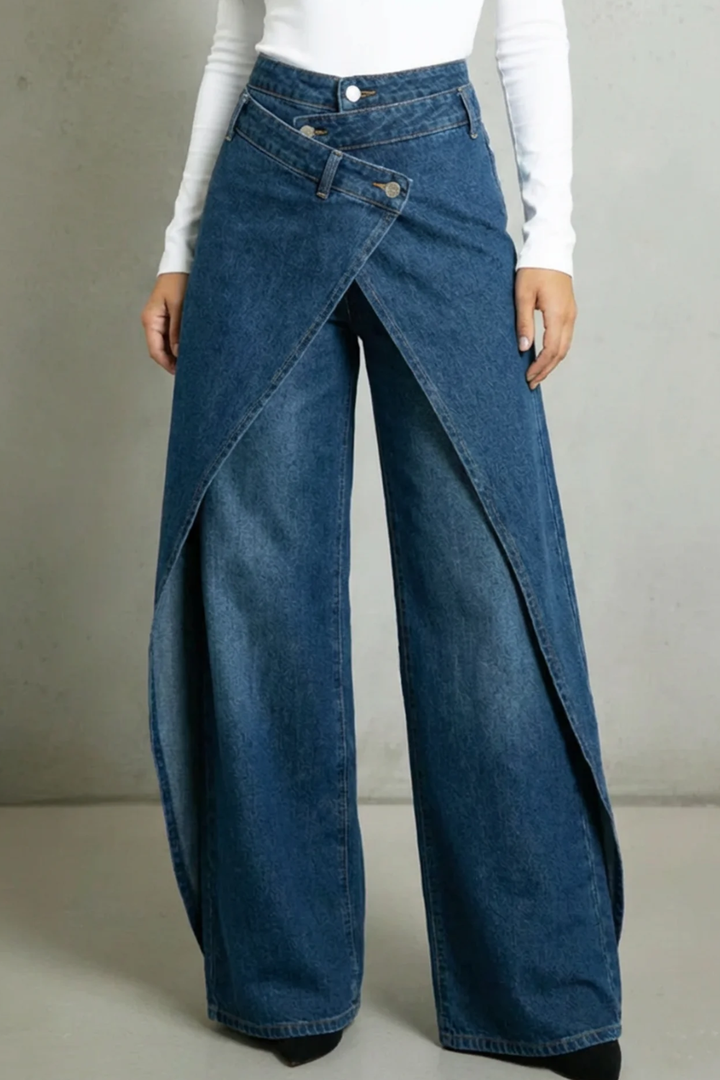 Vintage-inspired high-waisted denim jeans with a ruffled waistband and tie belt
