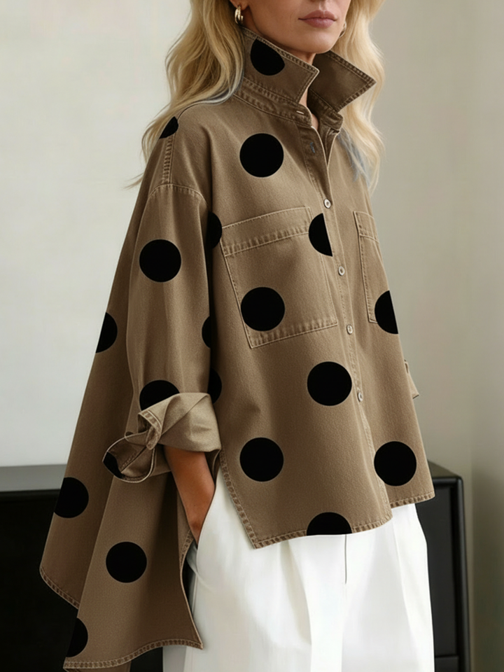 Polka-dot top with long sleeves, pockets, and buttons