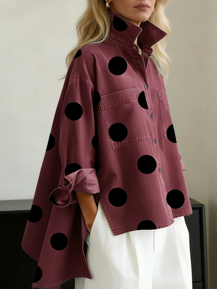 Polka-dot top with long sleeves, pockets, and buttons