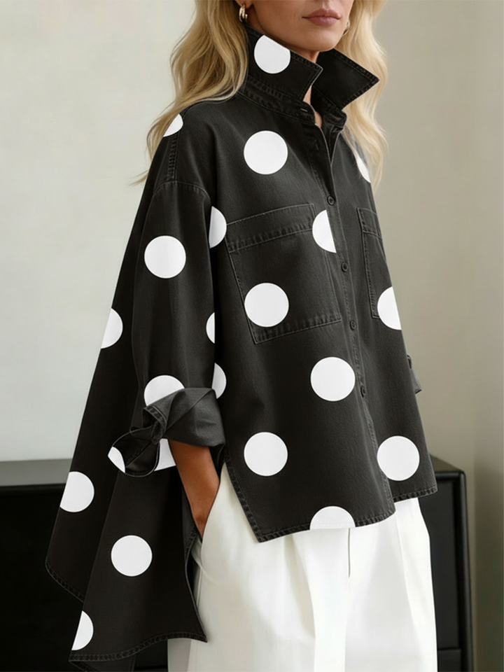 Polka-dot top with long sleeves, pockets, and buttons