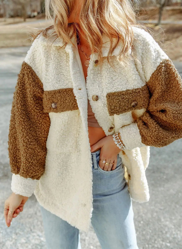 Women's shacket with buttons, pockets, and long sleeves